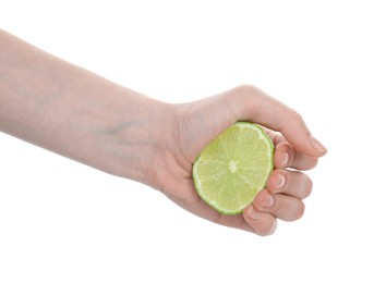 Photo of Woman squeezing lime on white background, closeup
