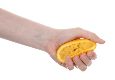 Photo of Woman squeezing orange on white background, closeup