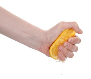 Photo of Woman squeezing orange on white background, closeup