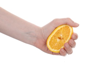 Photo of Woman squeezing orange on white background, closeup