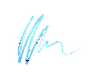 Photo of Light blue eye pencil strokes isolated on white, top view
