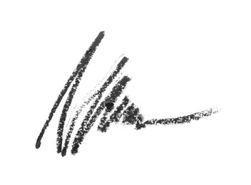 Photo of Black eye pencil strokes isolated on white, top view
