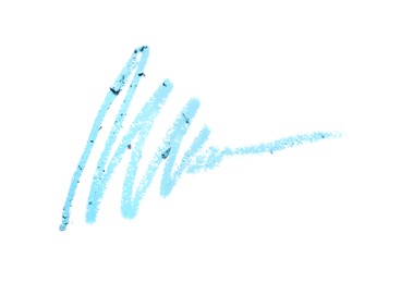 Photo of Light blue eye pencil strokes isolated on white, top view