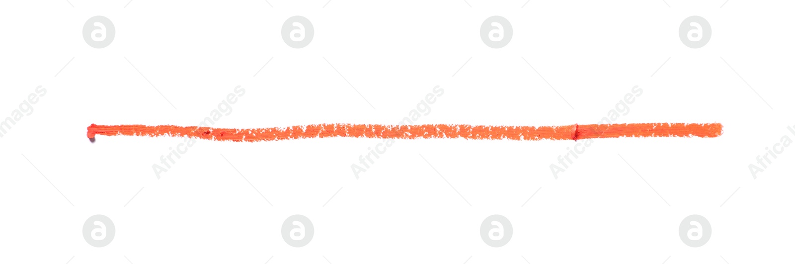 Orange eye pencil stroke isolated on white, top view Photo of Orange eye pencil stroke isolated on white, top view