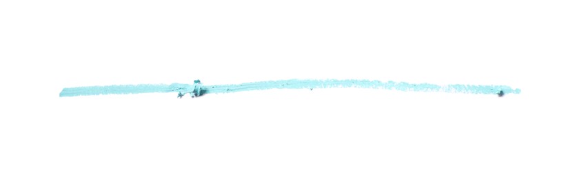 Photo of Light blue eye pencil stroke isolated on white, top view