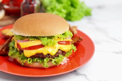 Photo of Tasty cheeseburger on white marble table, closeup