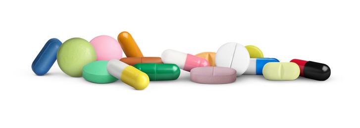 Image of Many different antibiotic pills on white background
