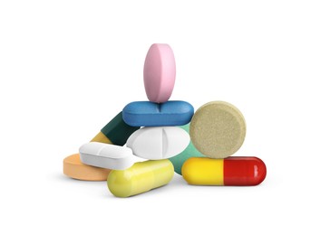 Image of Many different antibiotic pills on white background