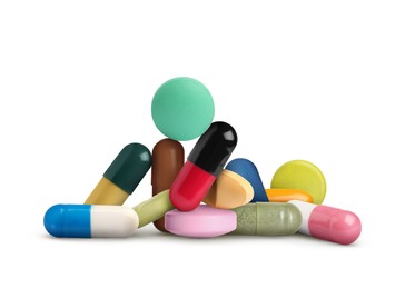 Image of Many different antibiotic pills on white background