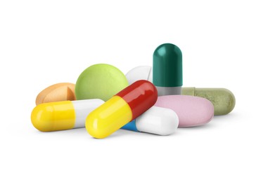 Image of Many different antibiotic pills on white background