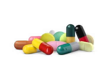 Image of Many different antibiotic pills on white background