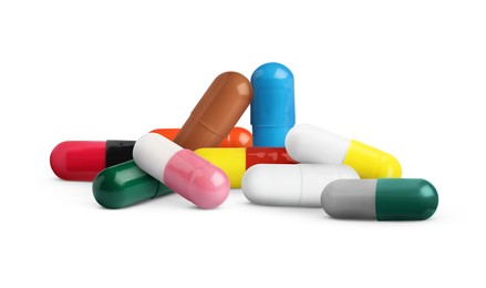 Image of Many different antibiotic pills on white background