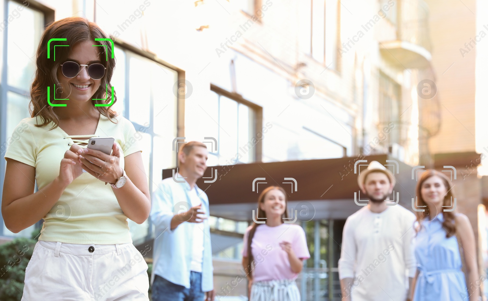 Facial recognition system identifying people on city street, selective focus Image of Facial recognition system identifying people on city street, selective focus
