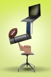 Image of Work-life balance. Tower of laptop, book, ball, mat and office chair on yellow gradient background