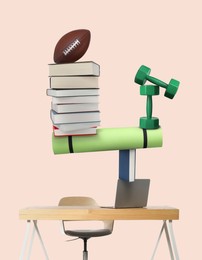 Image of Work-life balance. Tower of ball, dumbbells, books, mat, laptop and table on beige background