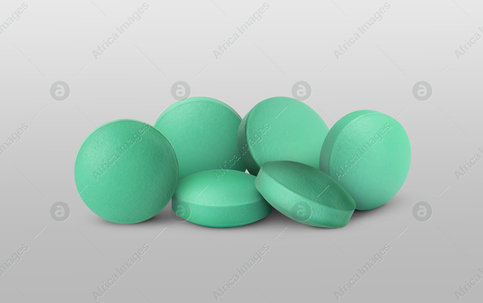 Antibiotic pills. Round tablets on grey gradient background. Banner design Image of Antibiotic pills. Round tablets on grey gradient background. Banner design