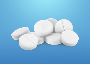 Image of Antibiotic pills. Round tablets on blue gradient background