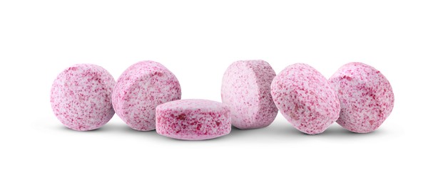 Image of Antibiotic pills. Round pink tablets on white background
