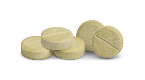 Image of Antibiotic pills. Round tablets on white background