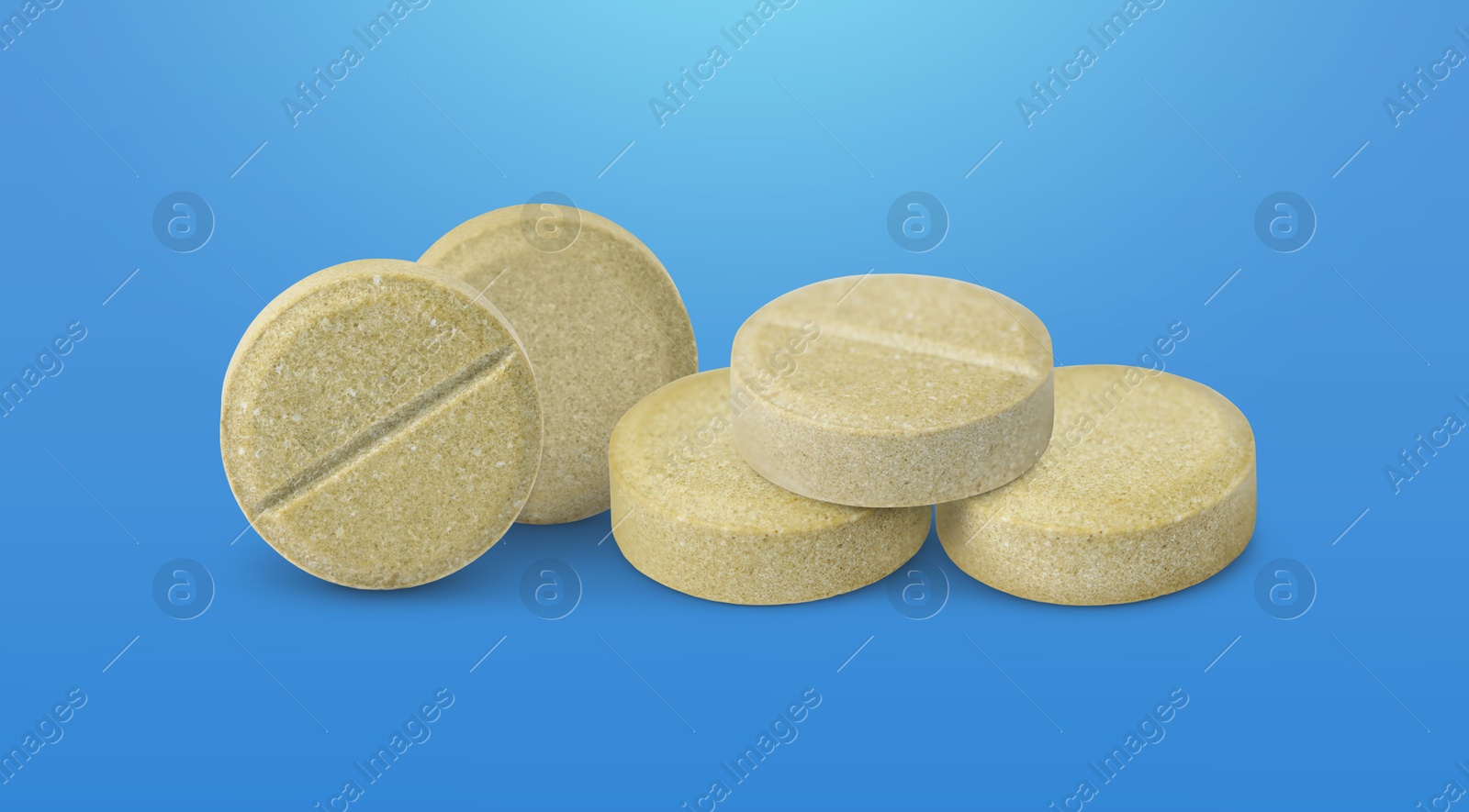 Antibiotic pills. Round tablets on blue gradient background. Banner design Image of Antibiotic pills. Round tablets on blue gradient background. Banner design