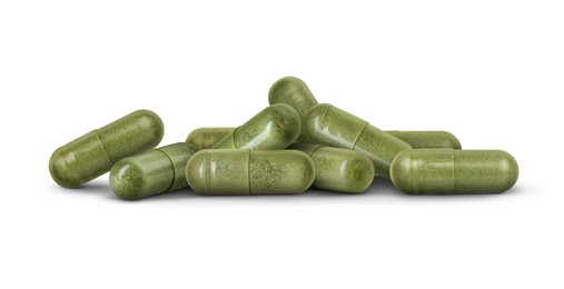 Image of Antibiotic pills. Green capsules on white background