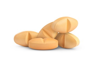 Image of Antibiotic pills. Oval orange tablets on white background