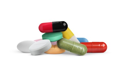 Image of Many different antibiotic pills on white background