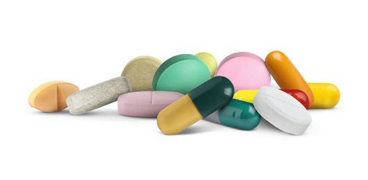 Image of Many different antibiotic pills on white background