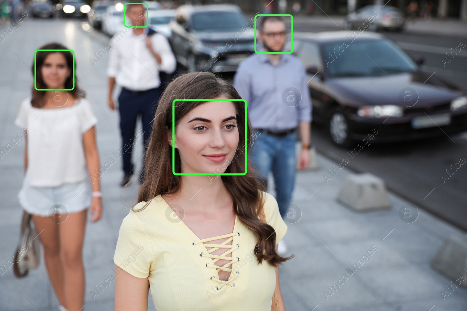 Facial recognition system identifying people on city street, selective focus Image of Facial recognition system identifying people on city street, selective focus
