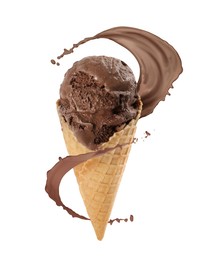 Image of Chocolate ice cream in waffle cone and splash of milk on white background