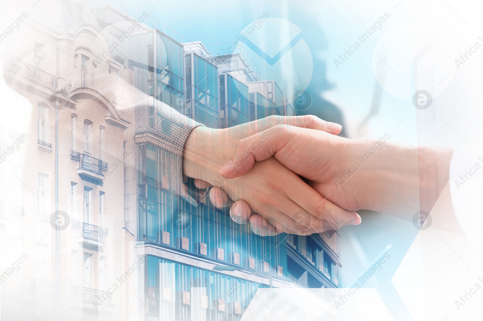 Businesspeople shaking hands, cityscape and graphs, multiple exposure. Deal or partnership concept Image of Businesspeople shaking hands, cityscape and graphs, multiple exposure. Deal or partnership concept