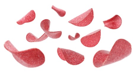 Image of Salami sausage slices flying on white background