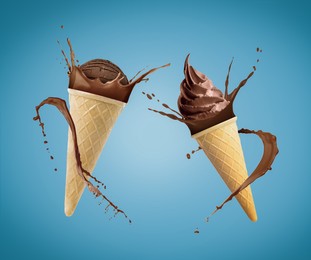Image of Chocolate ice cream in waffle cones and splash of milk on blue background