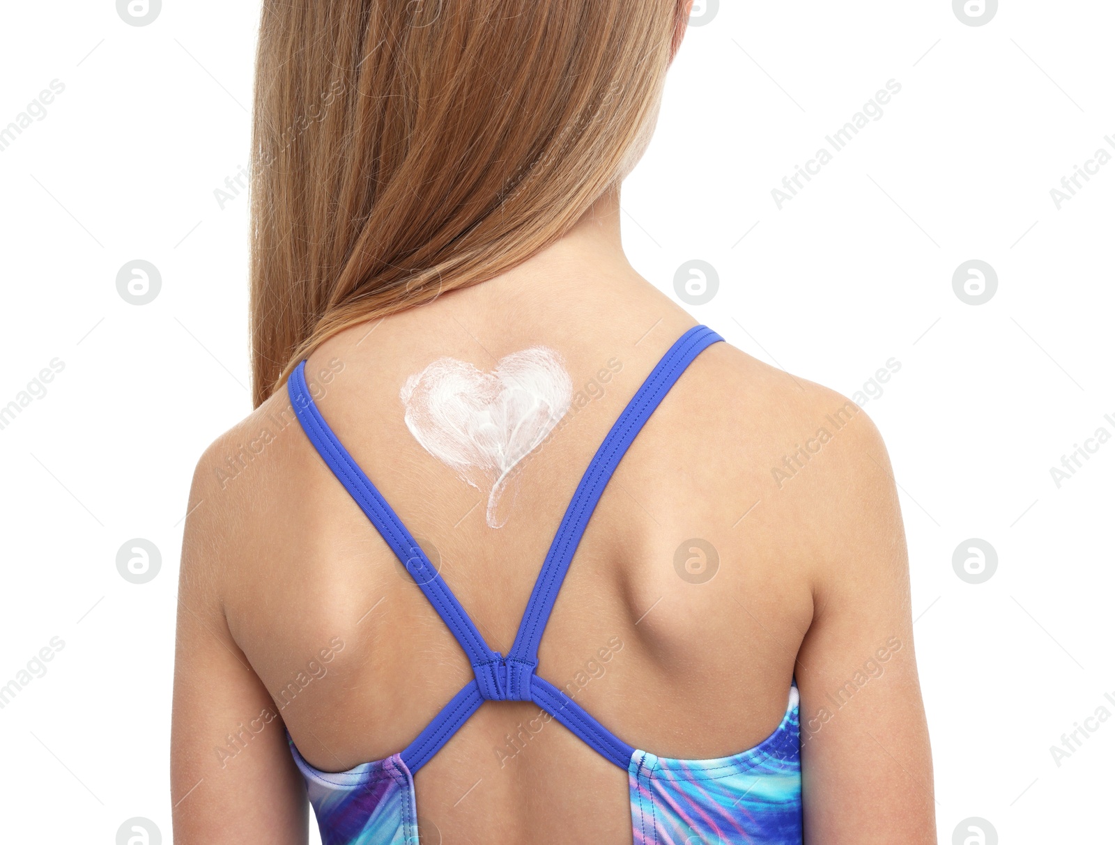 Little girl with sun protection cream on her skin against white background, back view Photo of Little girl with sun protection cream on her skin against white background, back view
