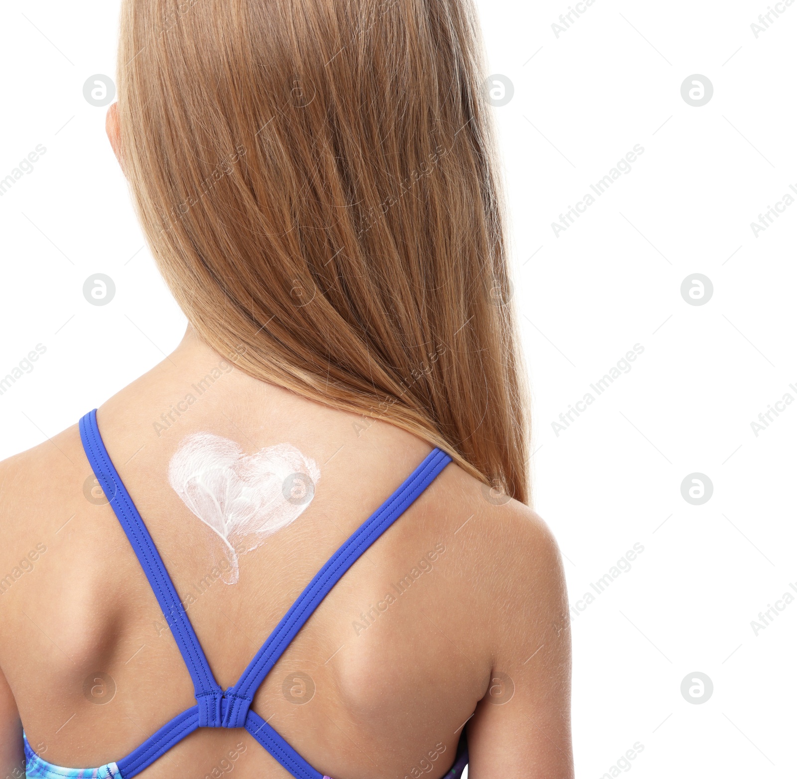 Little girl with sun protection cream on her skin against white background, back view Photo of Little girl with sun protection cream on her skin against white background, back view