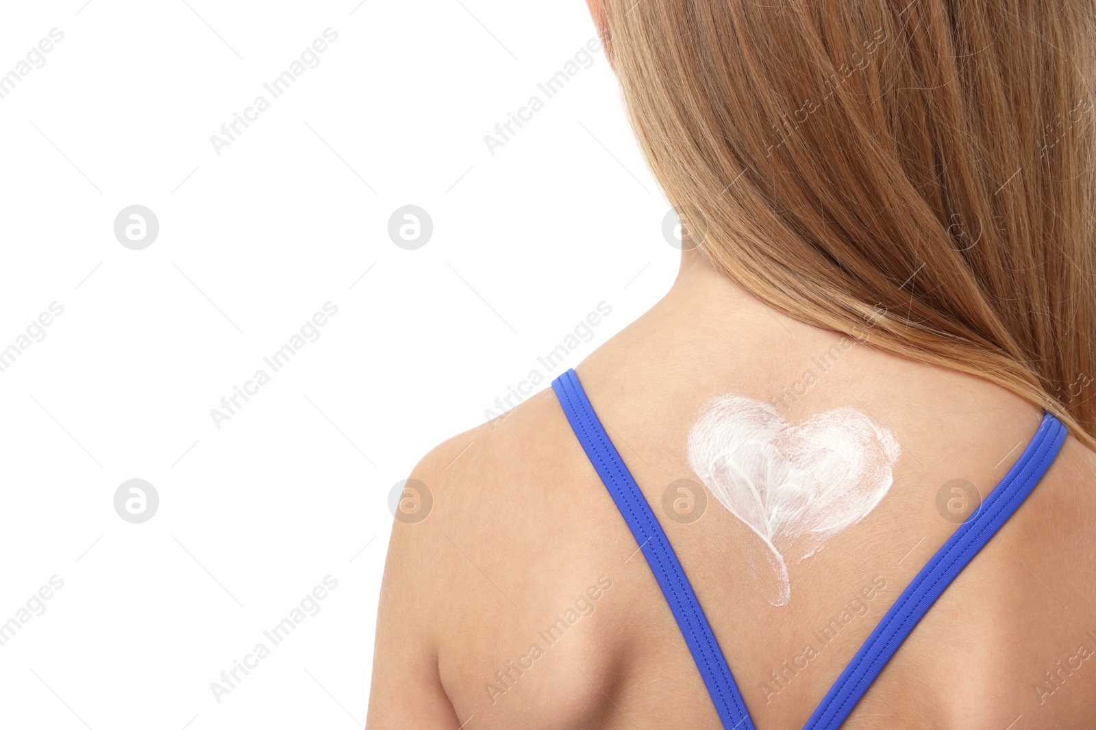 Little girl with sun protection cream on her skin against white background, back view Photo of Little girl with sun protection cream on her skin against white background, back view