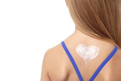 Photo of Little girl with sun protection cream on her skin against white background, back view