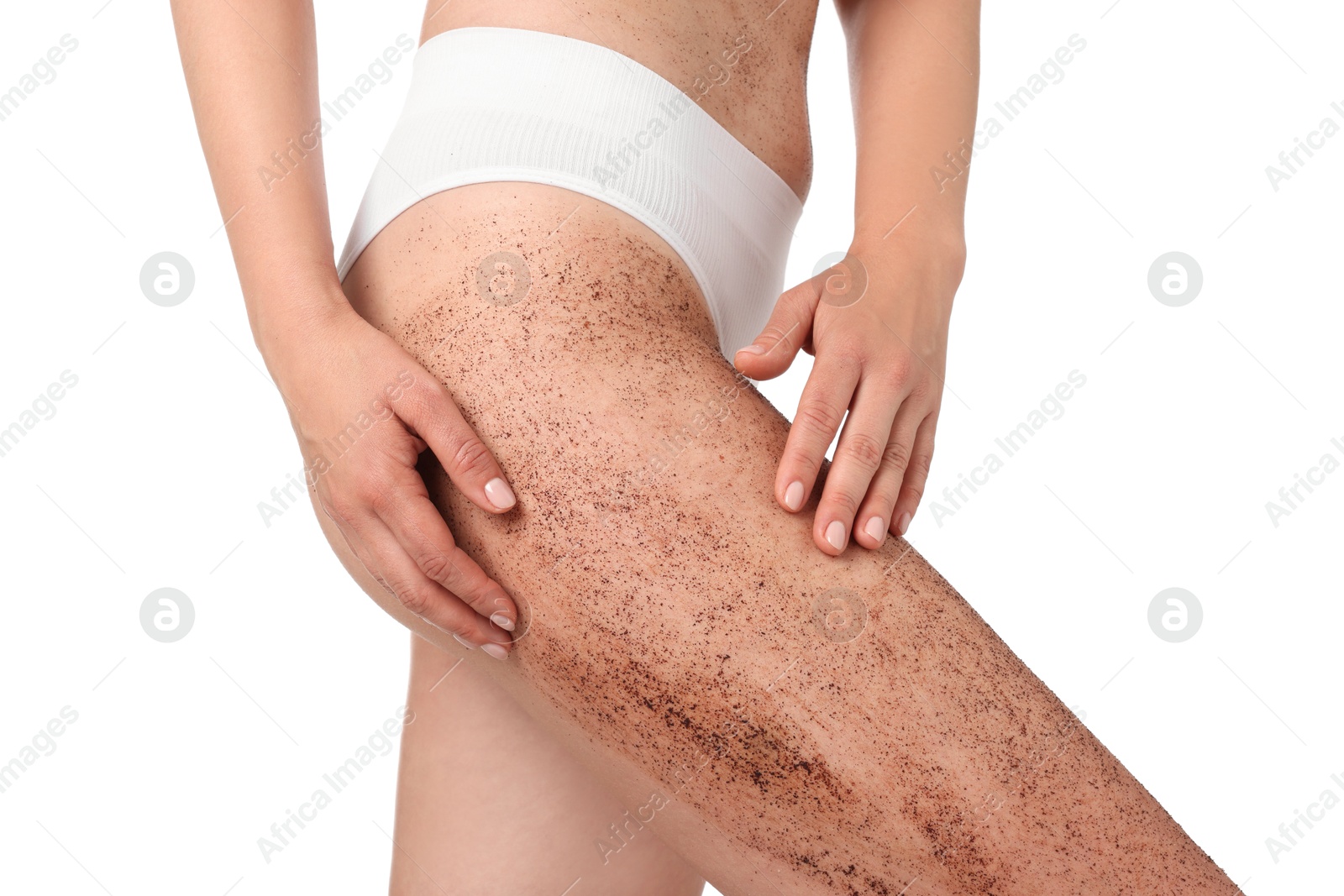 Woman with body scrub on her leg against white background, closeup Photo of Woman with body scrub on her leg against white background, closeup