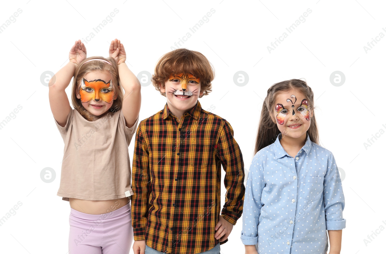 Group of kids with colorful face paintings on white background Photo of Group of kids with colorful face paintings on white background
