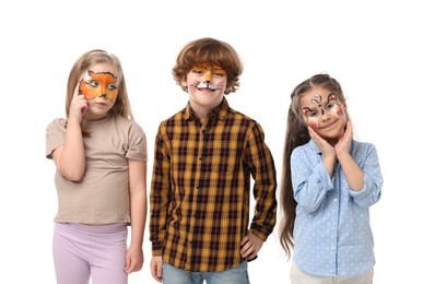 Photo of Group of kids with colorful face paintings on white background