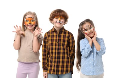 Photo of Group of kids with colorful face paintings on white background