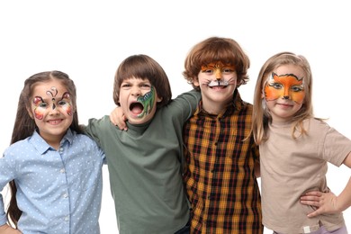 Photo of Group of kids with colorful face paintings on white background