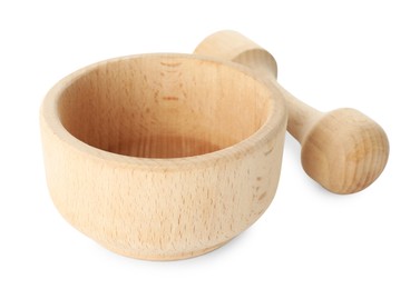 Photo of Wooden mortar with pestle isolated on white