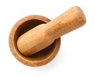 Photo of Wooden mortar with pestle isolated on white, top view