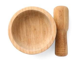 Photo of Wooden mortar with pestle isolated on white, top view