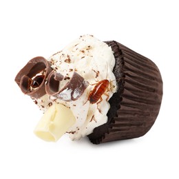Photo of Cockroach crawling on cupcake against white background