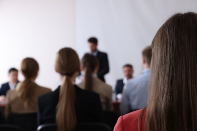 Photo of People having business training in conference room, selective focus
