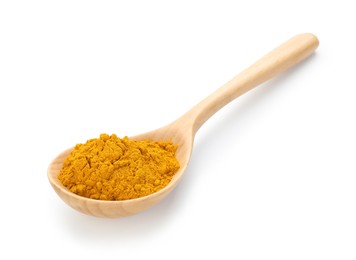 Photo of Turmeric powder in spoon isolated on white. Aromatic spice