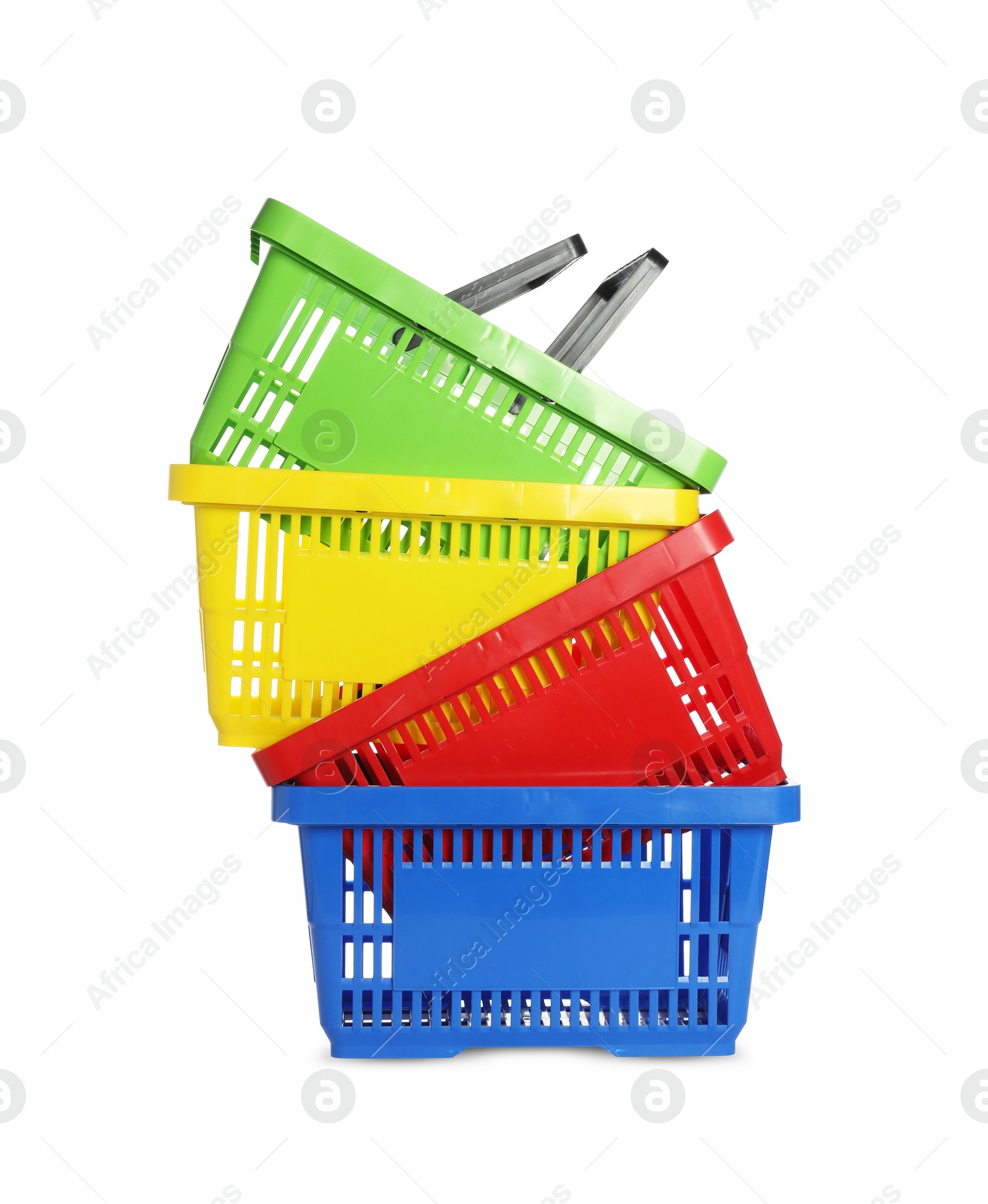 Stack of colorful shopping baskets isolated on white Photo of Stack of colorful shopping baskets isolated on white