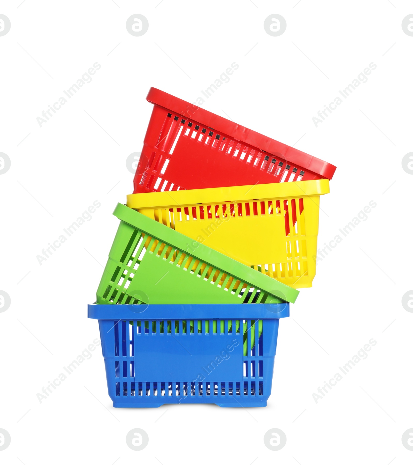 Stack of colorful shopping baskets isolated on white Photo of Stack of colorful shopping baskets isolated on white